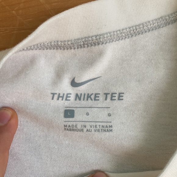 A white nike shirt. an oversized fit. - Picture 2 of 3